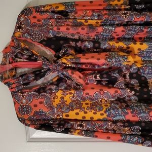 Long sleeve paisley dress NWOT SIZE 2X fits like 3X. I’m a 3X and it fit.